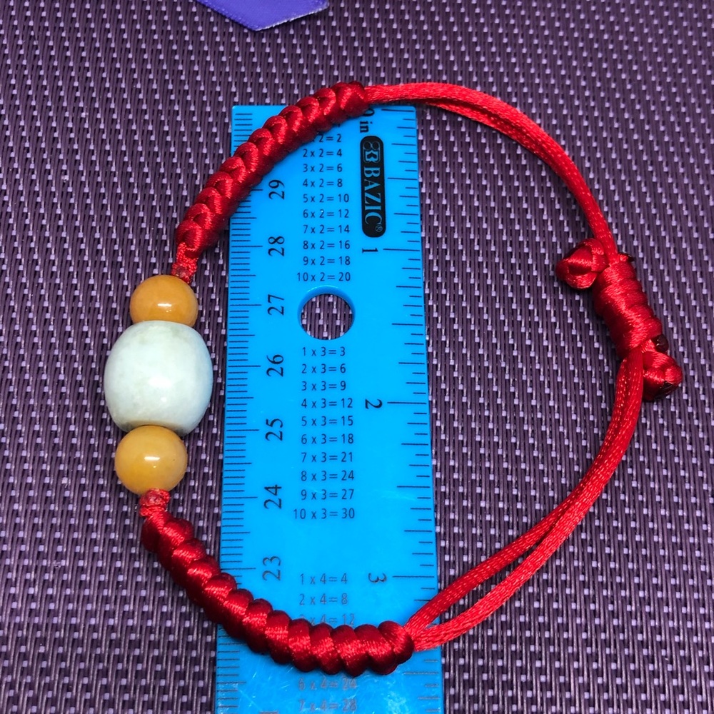 white & golden brown jade on cotton bracelet